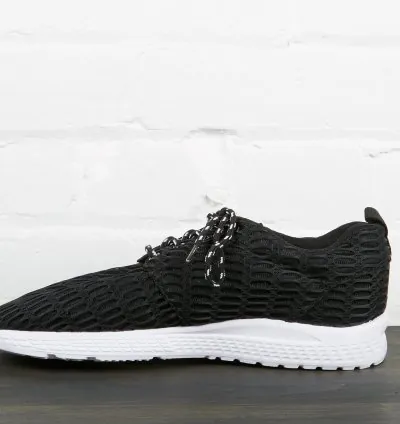 Black sneakers with white sole